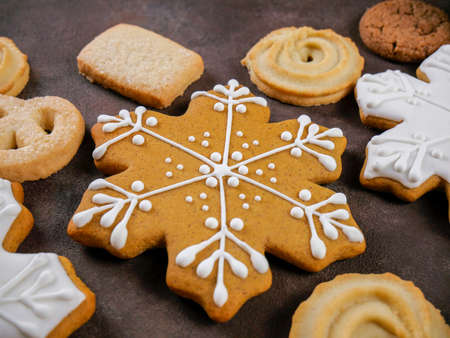 Christmas homemade gingerbread cookies on wooden backgroundの写真素材