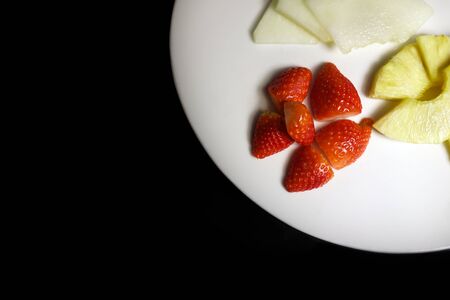 fruit salad with watermelon, pineapple and strawberriesの写真素材