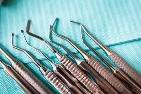 dental instruments on blue napkin. Top view with copy space for text.の写真素材