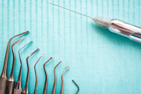 dental instruments on blue napkin. Top view with copy space for textの写真素材