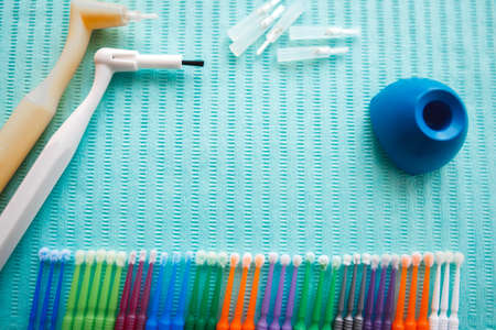 Disposable dental microbrush micro applicator - restorative dental product. Top view with copy space for text.の写真素材