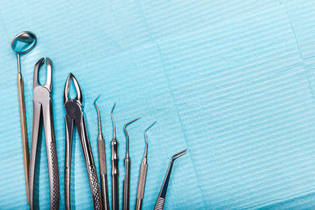 dental and endodontic instruments in hands. Top view.の写真素材