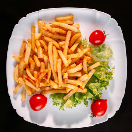 European international fusion cuisine, a beautiful dish on a white plate decorated with herbs and...