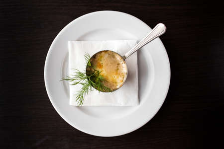 European international fusion cuisine, a beautiful dish on a white plate decorated with herbs and...