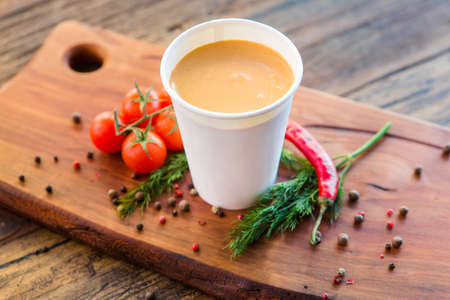 European international fusion cuisine, a beautiful dish on a white plate decorated with herbs and vegetables. a professional chef has prepared a delicious meal. Vegetarian food and meat restaurant dishes. fast food.の写真素材