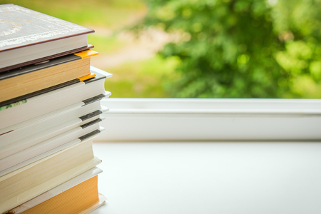 books on windowsill. concept of teaching, reading booksの写真素材