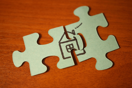 Build house from puzzles. Home concept. Parts of puzzle. Home concept.の写真素材