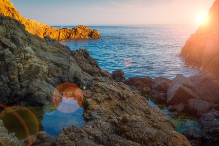 Beautiful morning sunrise in sea bay in Lloret de Mar, Spainの写真素材