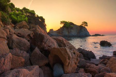 Sunrise in Lloret de Mar coast, Spain. Sea nature landscape in morning sunlight.の写真素材