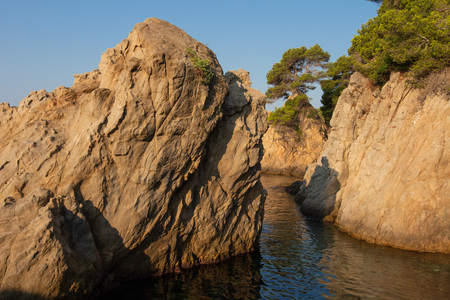 Cliffs in sea on Costa Brava coast, Spain. LLoret de Mar seascape. Sea nature in spanish shoreの写真素材