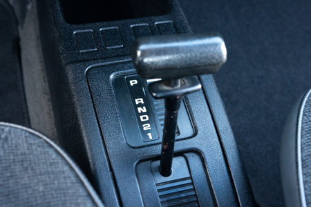 Retro automatic transmission in car cabin. Classic auto transmission
