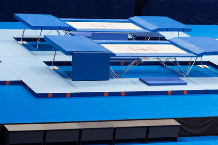 Empty trampolines in the sports arena during sport competitionsの写真素材