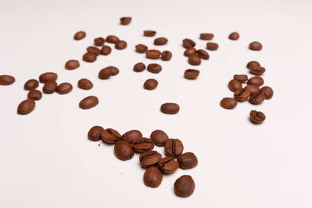 Macro shooting. Coffee beans on white backgroundの写真素材