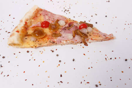 slice of pizza with mushrooms, brisket and sausage on a white backgroundの写真素材