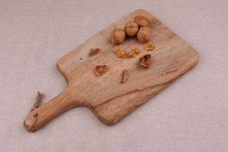 nuts on a wooden board closeup