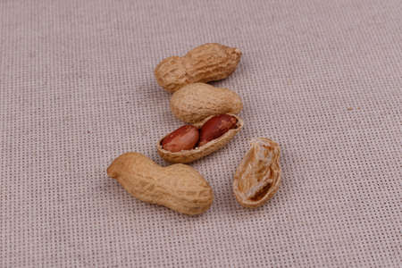 Peeled peanut on well peanuts