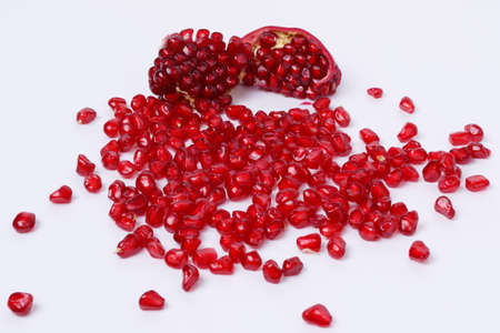 pomegranate seeds isolated on white background. top view. pomegranate berries.の写真素材