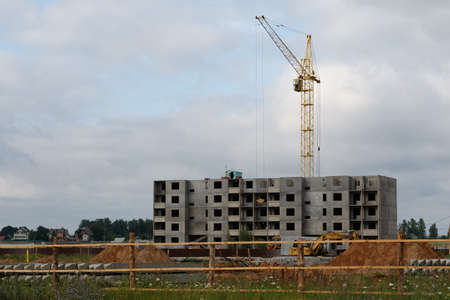 Construction of a residential building with cranes