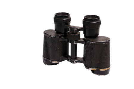 Old shabby binoculars on a white background. Close-up. Isolateの写真素材