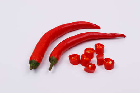 red hot chili peppers isolated on white background. Top view. Flat lay patternの写真素材