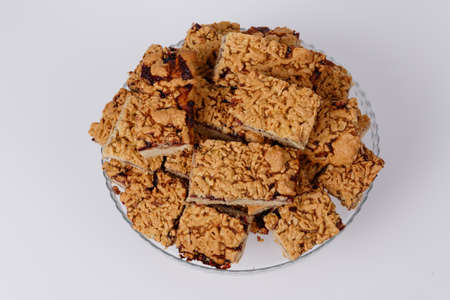 Homemade cookies with jam in a glass vase on a white background. Isolateの写真素材