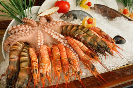 Fresh seafood on ice. Octopus, Shrimp and Fishの写真素材