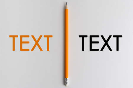An interactive photo composition of an orange pencil and space for creative thinking (text) is used for presentation in the field of education, business or creativity. Lighting on a pencil in the studio. White backgroundの写真素材
