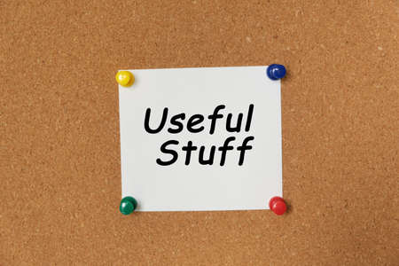 Text Useful Stuff written on a sticker pinned on a cork boardの写真素材
