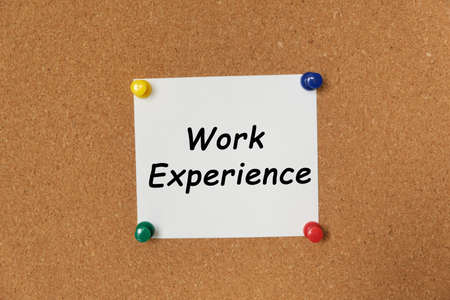 Text Work Experience written on a sticker pinned on a cork boardの写真素材