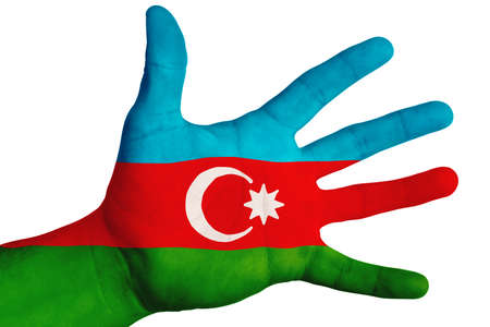 The national flag of Azerbaijan is depicted on the male hand. Image on a white backgroundの写真素材