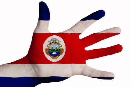 A man showing the flag of Costa Rica in the palm of his hand. Image on a white backgroundの写真素材