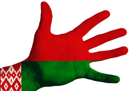 A man showing the flag of Belarus in the palm of his hand. Image on a white backgroundの写真素材