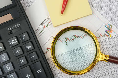 Image of a businessman workplace with papers. . Financial conceptの写真素材
