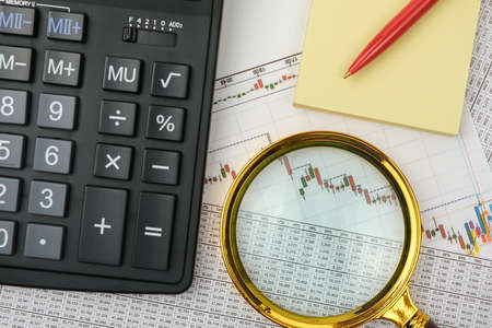 Image of a businessman workplace with papers. . Financial conceptの写真素材