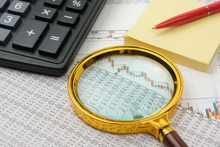 Image of a businessman workplace with papers. . Financial conceptの写真素材