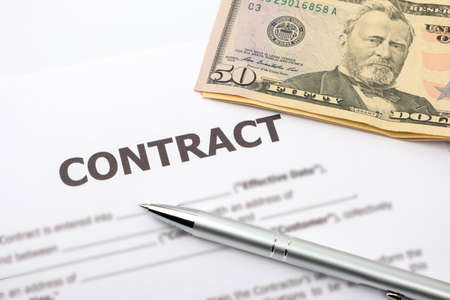 Pen, dollar and contract. Profitable business contract concept. Close-upの写真素材