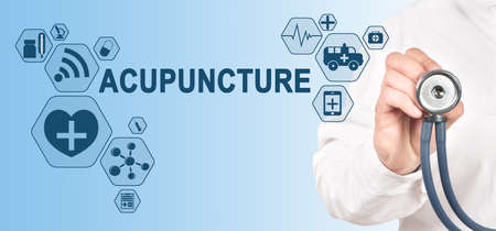 ACUPUNCTURE diagnosis medical and healthcare concept. Doctor with stethoscope.の写真素材
