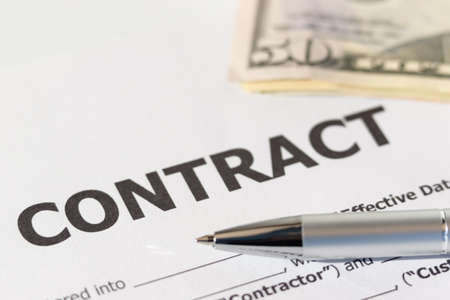 Pen, dollar and contract. Profitable business contract concept. Close-upの写真素材