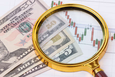 Coins twisted dollars in the background. Background for business ideas and design. Business conceptの写真素材
