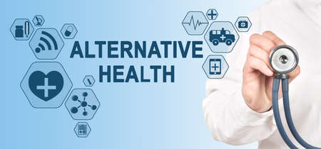 ALTERNATIVE HEALTH diagnosis medical and healthcare concept. Doctor with stethoscope.の写真素材