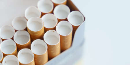 The concept of medicine is the fight against smoking. Cigarette filters are visible from the pack. Close-upの写真素材
