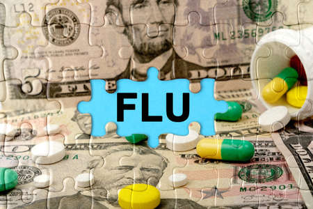 Double exposure. Puzzles depicting pills and dollars with the inscription -FLU. The concept of medicine.の写真素材