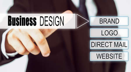Finance and business concept. Businessman presses button on the interactive screen with the inscription - Business designの写真素材