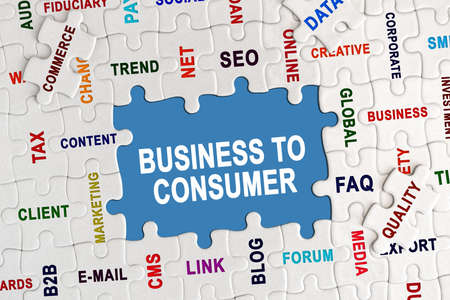 Economy and business concept. Puzzle with economic captions, in the center the inscription - BUSINESS TO CONSUMERの写真素材