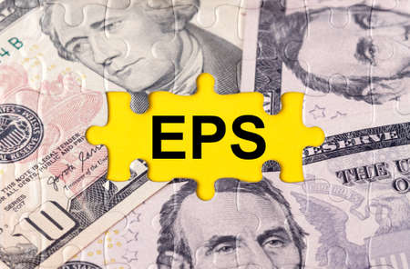 Business concept. Puzzle with the image of dollars in the center of the inscription -EPSの写真素材