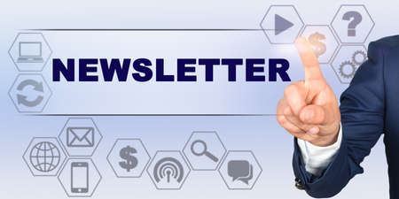 Business concept. Businessman touching virtual screen with his finger. Screen caption - NEWSLETTERの写真素材