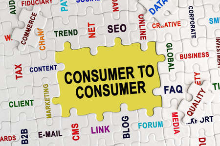 Economy and business concept. Puzzle with economic captions, in the center the inscription -CONSUMER TO CONSUMERの写真素材
