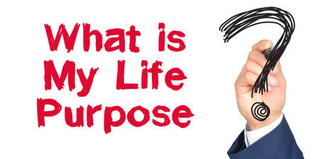 Hand with marker writing: What is My Life Purpose. Hand of a businessman with a marker.の写真素材