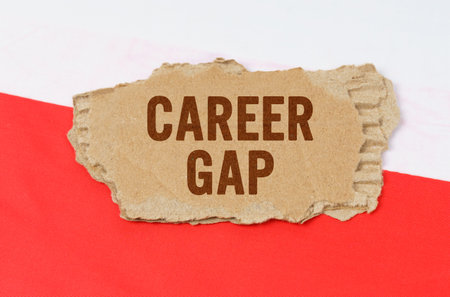 Business and finance concept. Against the background of the Polish flag lies cardboard with the inscription - Career Gapの写真素材