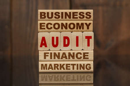Finance and economics concept. Wooden blocks with the text - Business, Economy, Finance, Marketing...